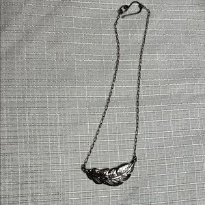 Elegant Silver Feather Pendant Necklace